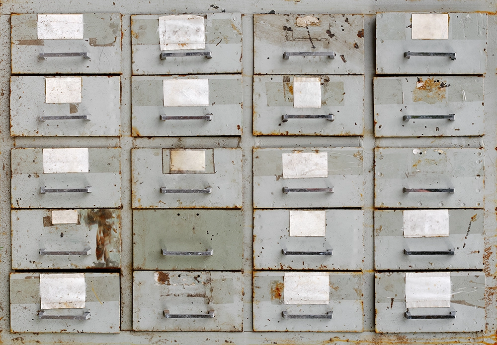 Close-up of filing cabinet drawers ready for removal by Haulin Ass Junk Removal