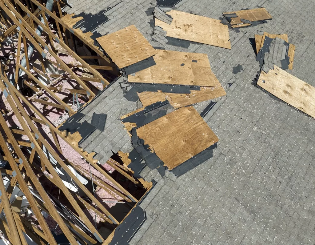 Storm-damaged debris from a property